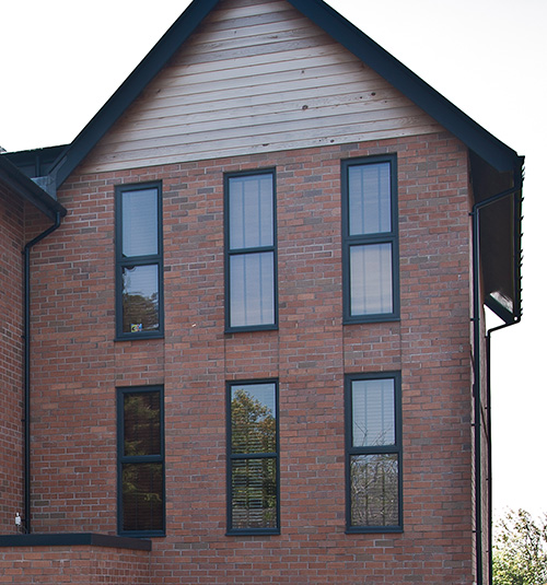 Modern property with dark grey aluminium windows Truro