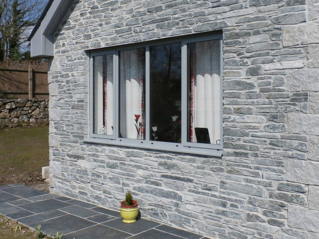 Grey aluminium window on a stone house – double glazing in Penryn, Cornwall