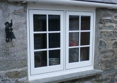 French style flushsash in white woodgrain with astragal bars