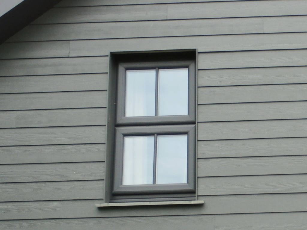 Grey aluminium window on a clad house – double glazing in Penryn, Cornwall