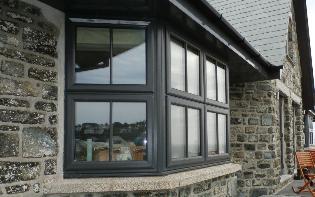 Anthracite grey double glazed window fitting in penzance