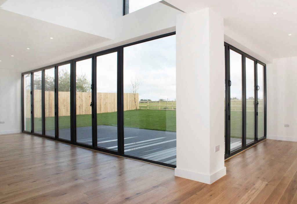 Black aluminium glazed doors in a modern home by All Glass Cornwall